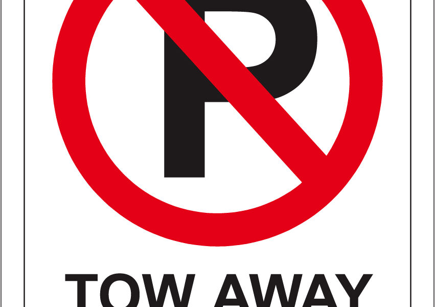 Tow away zone sign